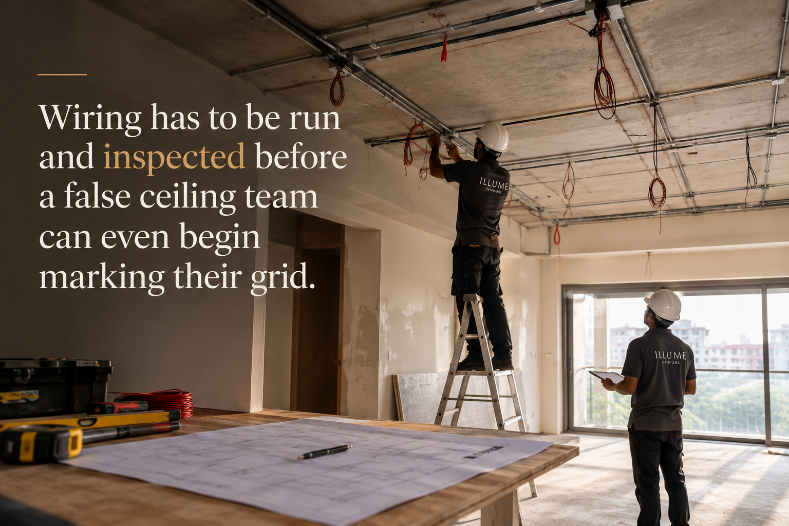 Interior design coordination: electrician running conduit wiring before a wall is closed up